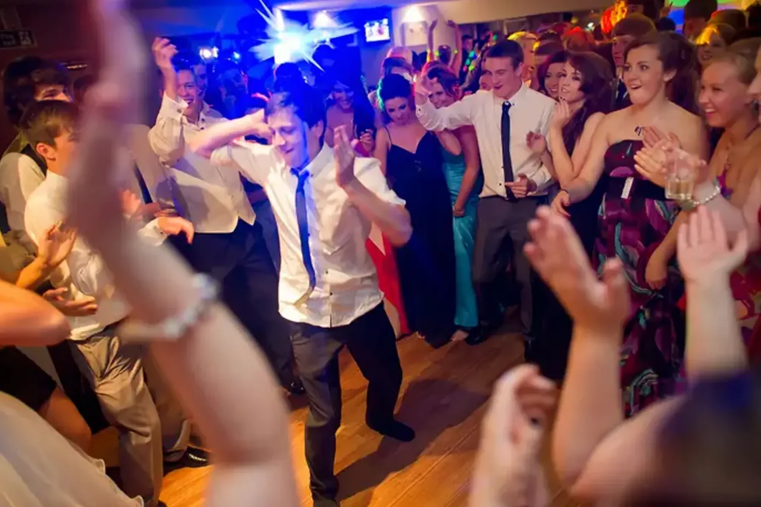 Toledo school dance DJ at homecoming with dance floor lighting